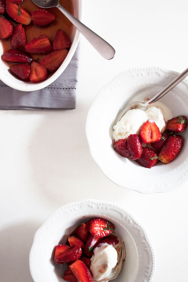 macerated strawberries with ice cream bowls