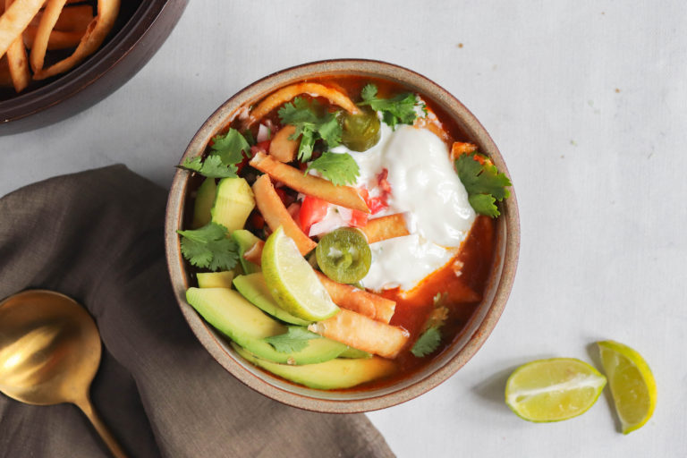 Mexican Tortilla Soup - Delicious spicy soup with toppings - Sprig & Vine